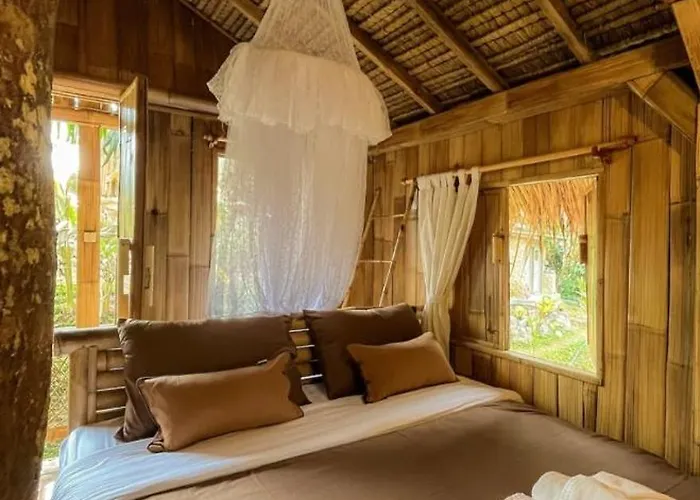 Tree Bamboo House مزرعة للإقامة *